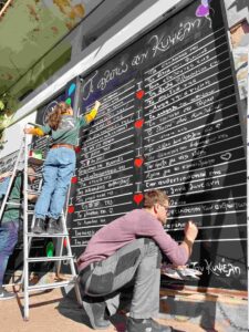 Creating a chalkboard at the local market of Kypseli (Athens, Greece)