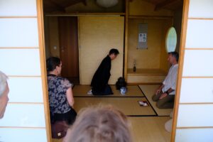 Japanese tea master celebrates traditional tea ceremony in the garden (Graz, Austria)